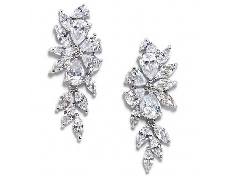 A pair of silver earrings featuring multiple clear, marquise and pear-shaped gemstones arranged in a cascading floral design.