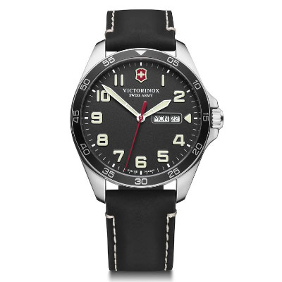 Victorinox Swiss Army wristwatch with a black face, white numerals, day and date display, black leather strap, and silver-tone case.