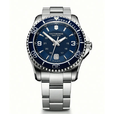 A stainless steel Victorinox wristwatch with a blue dial, white markers, date display at 6 o’clock, and a metal link bracelet.