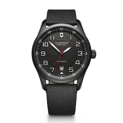 A Victorinox Swiss Army black analog wristwatch with a black dial, white numerals, red second hand, date window at 6 o’clock, and a black textured strap.